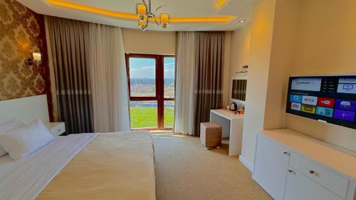TV o dispositivi per l'intrattenimento presso Green Roof Boutique Hotel & SPA Istanbul Airport