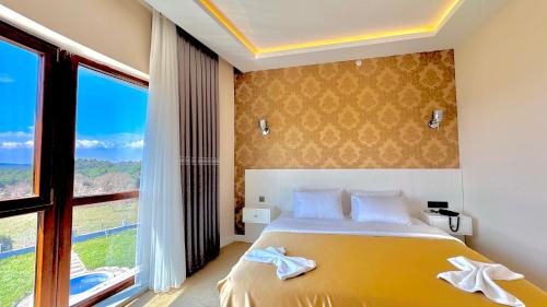 Letto o letti in una camera di Green Roof Boutique Hotel & SPA Istanbul Airport