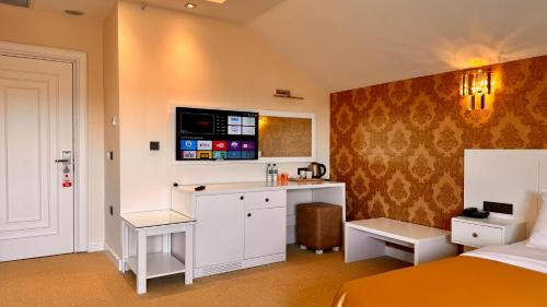 TV o dispositivi per l'intrattenimento presso Green Roof Boutique Hotel & SPA Istanbul Airport