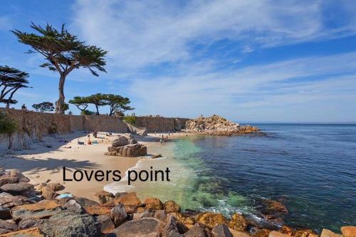 a beach with a tree and the words lovers point at Large Monterey Bay House close to Aquarium, Golf in Seaside