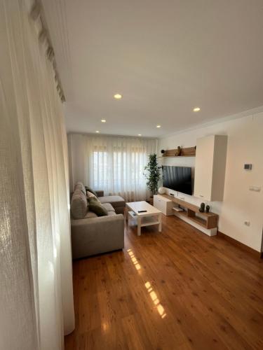 Et opholdsområde på Apartamento Fana