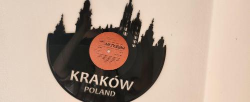 a sign on a wall that reads krakow poland at Nature in Kraków