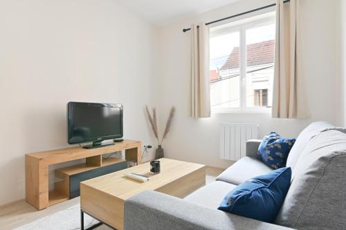 Photo de la galerie de l'établissement Appartement t3 rénové avec jardin, au Creusot