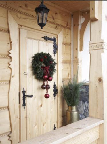 a door with a christmas wreath on it at Villa Dorota in Zakopane