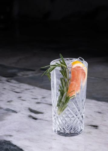 a glass of water with a piece of fruit in it at Sheraton Grand Seattle in Seattle