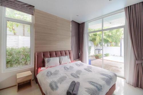 Katil atau katil-katil dalam bilik di Near Beach One Pool Villa 1