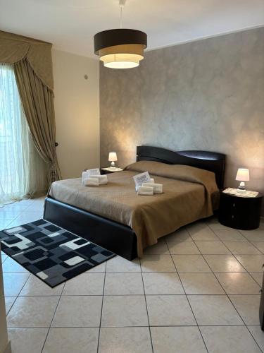 Cama o camas de una habitación en Il Sole dell'Alcantara