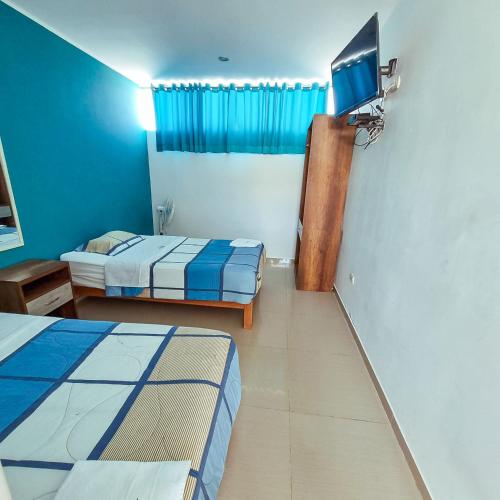 Ένα ή περισσότερα κρεβάτια σε δωμάτιο στο Hotel Costa Sur