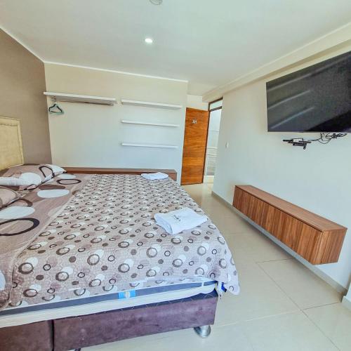 Ένα ή περισσότερα κρεβάτια σε δωμάτιο στο Hotel Costa Sur