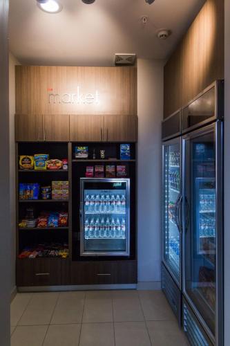 a grocery store with a display of drinks at Residence Inn by Marriott Oklahoma City Northwest in Oklahoma City