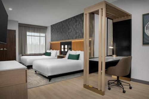 Cama o camas de una habitación en SpringHill Suites by Marriott Sandpoint