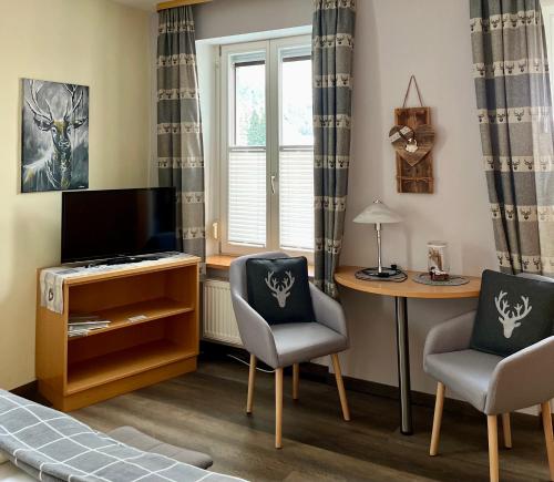 TV a/nebo společenská místnost v ubytování Gasthaus Schützen
