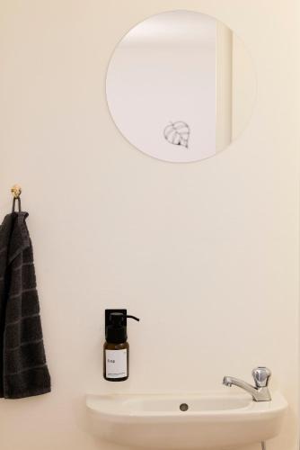 Stilvolle Gartenterrassenwohnung mitten in Bregenzにあるバスルーム