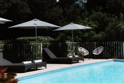 Πισίνα στο ή κοντά στο Hôtel Les Fougères - Hossegor