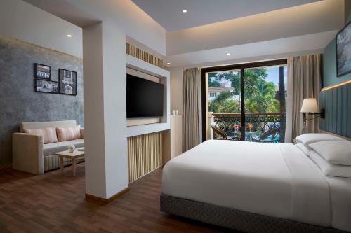 Postel nebo postele na pokoji v ubytování Park Inn by Radisson Goa Candolim