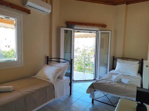 Postel nebo postele na pokoji v ubytování Sea View House