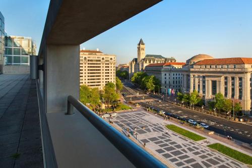 a view of a city street from a balcony at JW Marriott Washington, DC in Washington