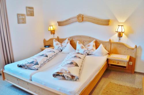 Katil atau katil-katil dalam bilik di Ferienhotel Barmsee