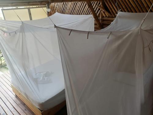 Cabaña Beach Palominoにあるベッド