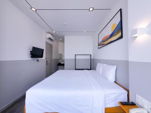 Voodi või voodid majutusasutuse FIT Hotel Can Tho toas