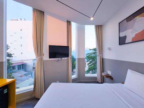 Televiisor ja/või meelelahutuskeskus majutusasutuses FIT Hotel Can Tho