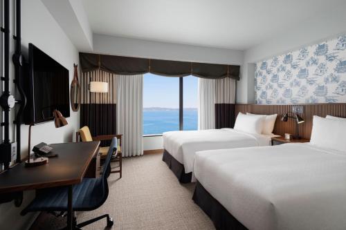 Voodi või voodid majutusasutuse Four Points by Sheraton Nagoya, Chubu International Airport toas