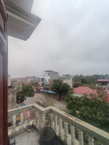 a view of a city from a balcony at Nhà Nghỉ Minh Đức in Kim Côn
