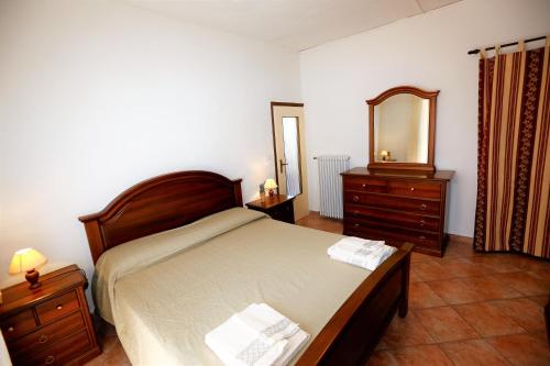 Cama o camas de una habitación en Casa Colonne Fiorite