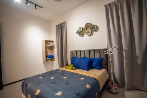 Seaview Urban suites Georgetown @Penang tesisinde bir odada yatak veya yataklar