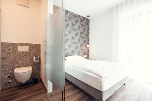 Koupelna v ubytování Hotel CampingPark Steiner