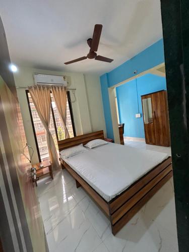 Tempat tidur dalam kamar di La Residence