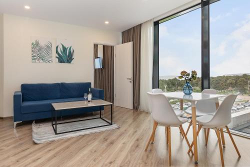 Χώρος καθιστικού στο Bellevue Residence Suites