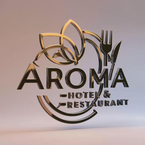 logotipo de hotel y restaurante con tenedor en Aroma Hotel & Restaurant, en Dādri