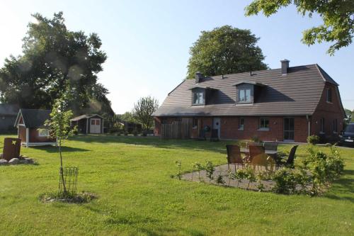 Κήπος έξω από το Ferienhaus Uhlenstraat