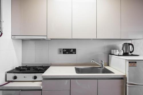Kuchyň nebo kuchyňský kout v ubytování KensingtonResort JirisanNamwon
