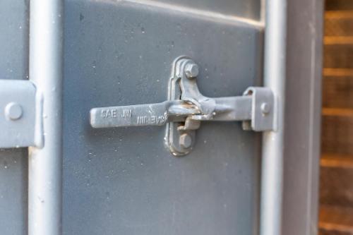 a metal door with a lock on it at ART LOFTS Valencia by Benisur in Valencia