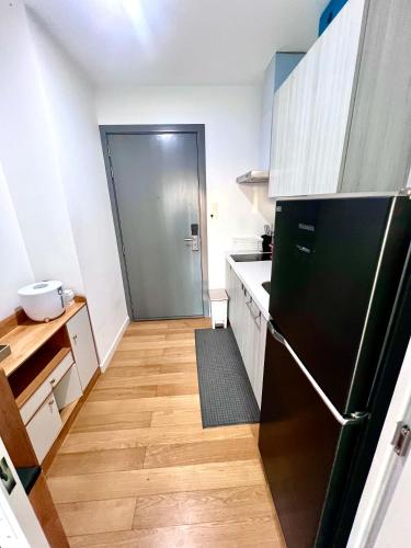 Η κουζίνα ή μικρή κουζίνα στο Acqua Private Residences - Iguazu Tower, Mandaluyong - Makati