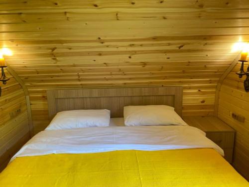 Krevet ili kreveti u jedinici u objektu wood house