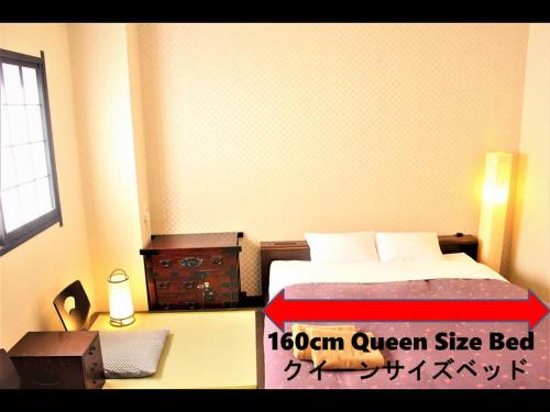 Ένα ή περισσότερα κρεβάτια σε δωμάτιο στο K's House Tokyo Oasis - Quality Hostel in Asakusa
