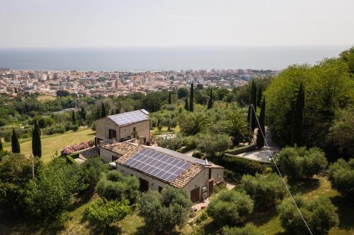 an aerial view of a house with solar panels on the roof at Villa Cri Cri B&B di Charme in San Benedetto del Tronto