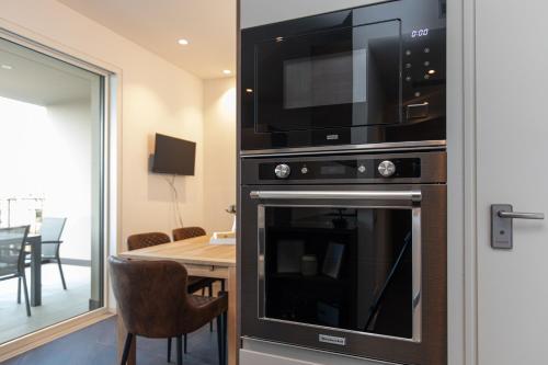Dapur atau dapur kecil di Prestige Garda Home - Borgo Secolo