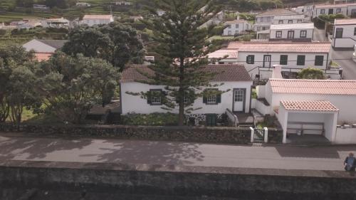 a view of a city with white houses at Terra`s Place in Santo Amaro