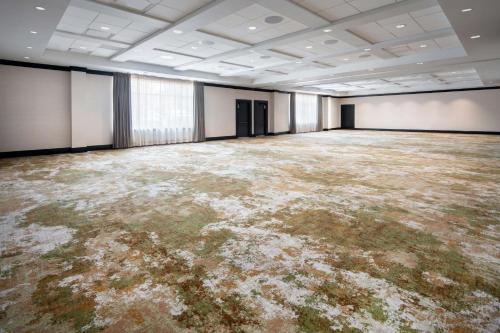 an empty room with a large room with a large room at The Westin Dallas Stonebriar Golf Resort & Spa in Frisco