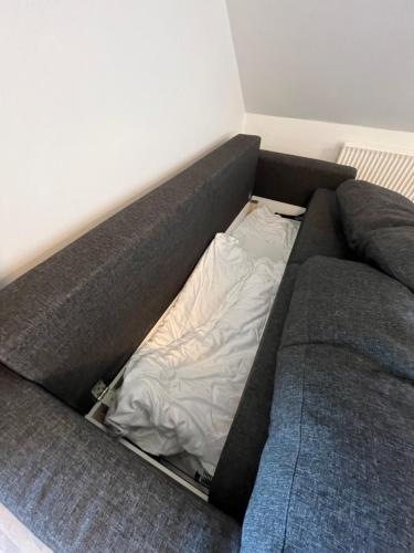 a bed in the corner of a room at Go-Sleep Bredehus in Bredsten