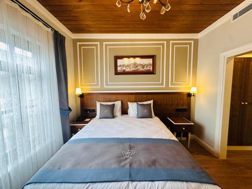 Postel nebo postele na pokoji v ubytování Ferman Hotel Old City -Special Category