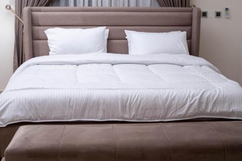 Ein Bett oder Betten in einem Zimmer der Unterkunft 2-Bedroom Apartment