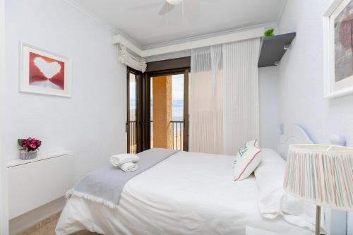 Posteľ alebo postele v izbe v ubytovaní Beach Haven by Fidalsa