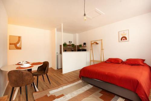 En eller flere senge i et værelse på Sweet Home : : studio en Hypercentre Cathédrale