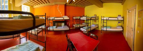 a room with a bunch of bunk beds in it at Strowis Hostel in Utrecht