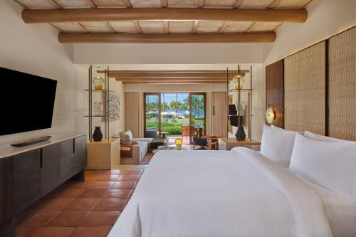 Postel nebo postele na pokoji v ubytování The St. Regis Punta Mita Resort